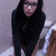 A pretty black girl records herself taking a shit while sitting on a toilet. She sprays deodorant into the air, shows us her finished product, and then wipes her ass. Over 4.5 minutes.